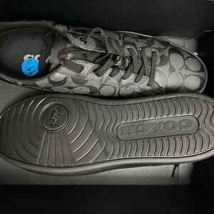 Bold black Coach signature canvas sneakers